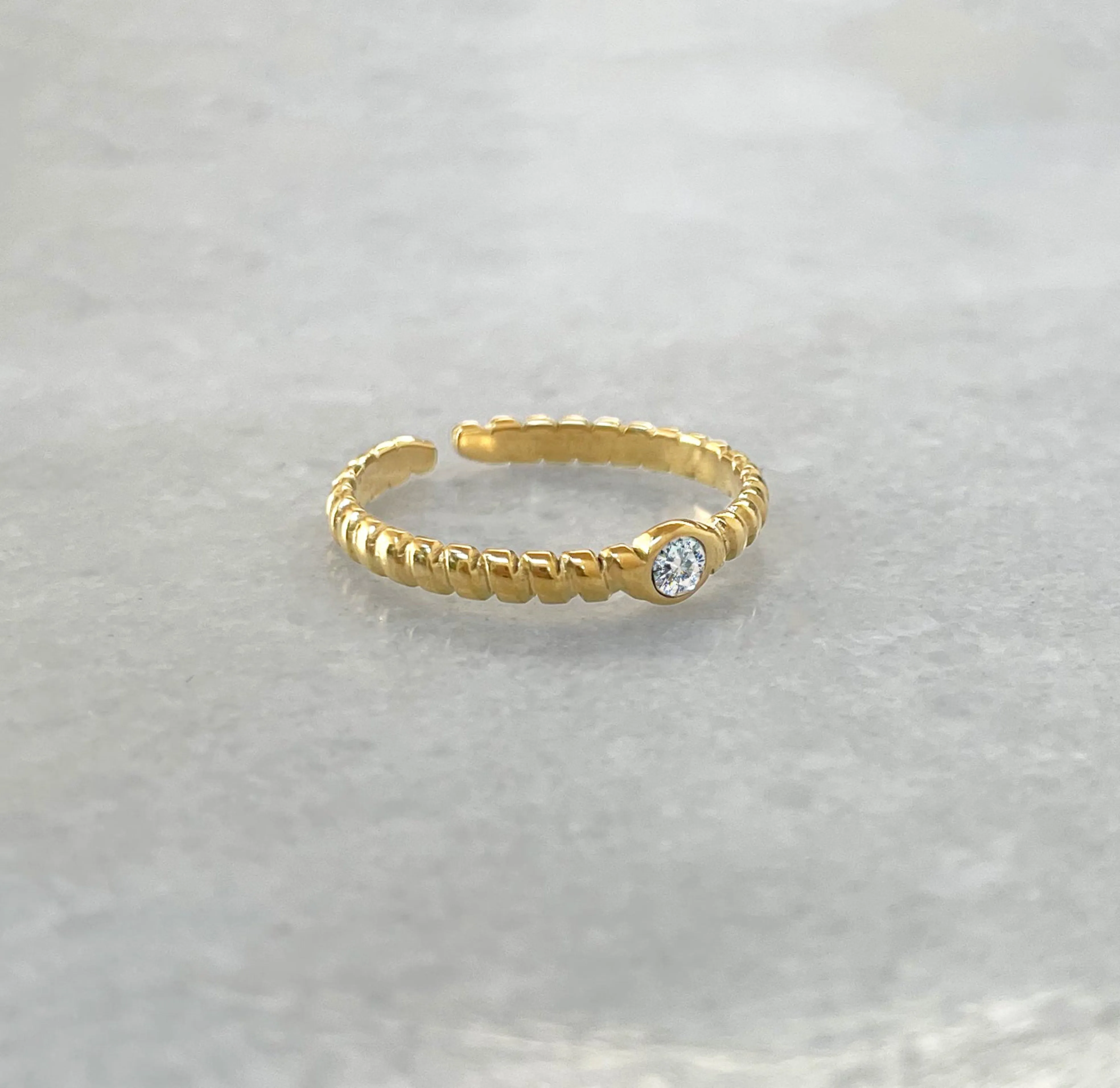 HELINA ADJUSTABLE DAINTY GOLD SOLITAIRE STACKABLE RING